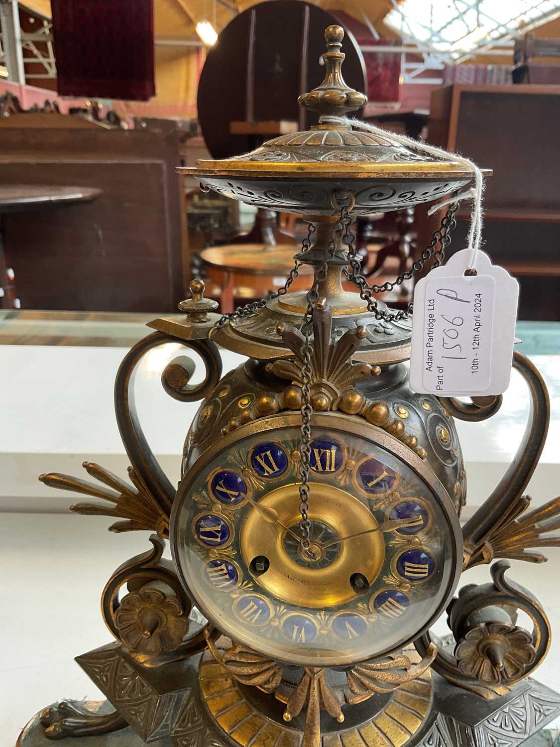 An aesthetic movement French bronze and gilt metal mantel clock with circular finial above the - Image 10 of 10