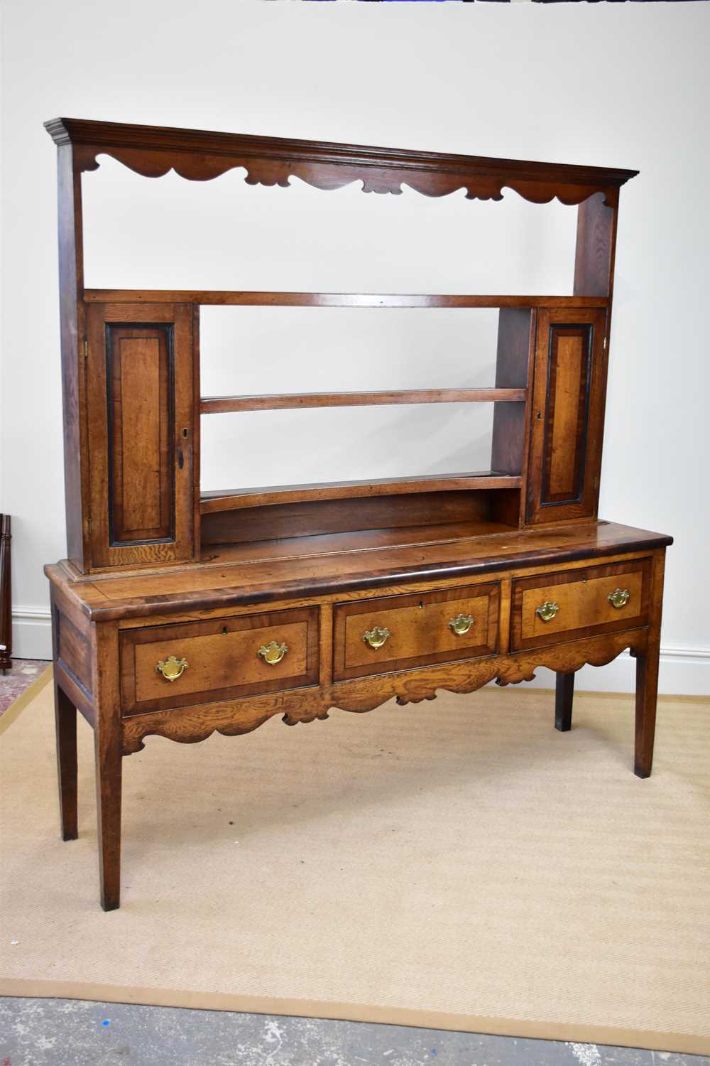 An 18th century oak and mahogany crossbanded dresser with open plate rack back, with three fixed - Image 2 of 4