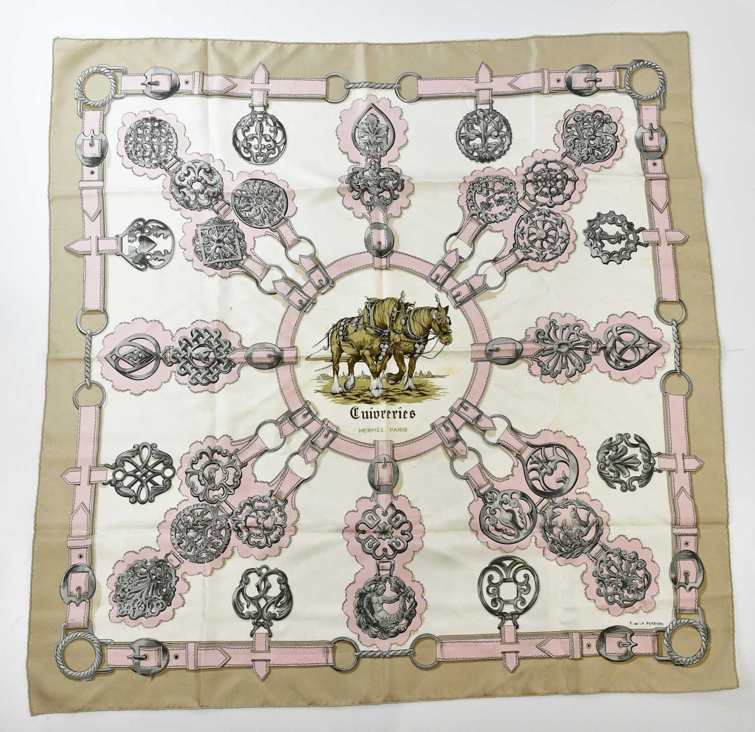 HERMÈS; a 100% silk Cuivreries scarf, in beige, pink and silver, designed and signed by F. de la