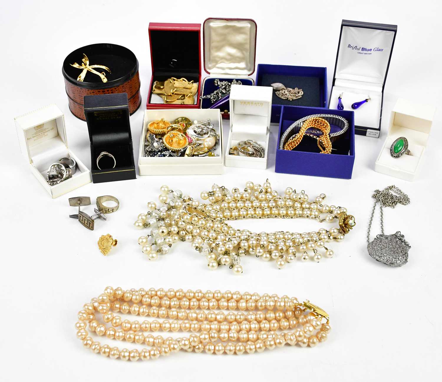 A small collection of costume jewellery to include rings, ear studs, necklaces, bracelets, etc.