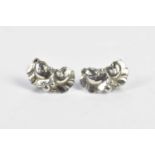 HAROLD NIELSON FOR GEORG JENSEN; a pair of sterling silver '50A' clip back earrings. Condition