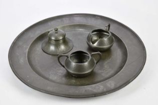 A 19th century pewter charger with touch marks, diameter 46cm, a Granby pewter inkwell and a