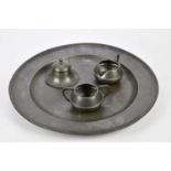 A 19th century pewter charger with touch marks, diameter 46cm, a Granby pewter inkwell and a