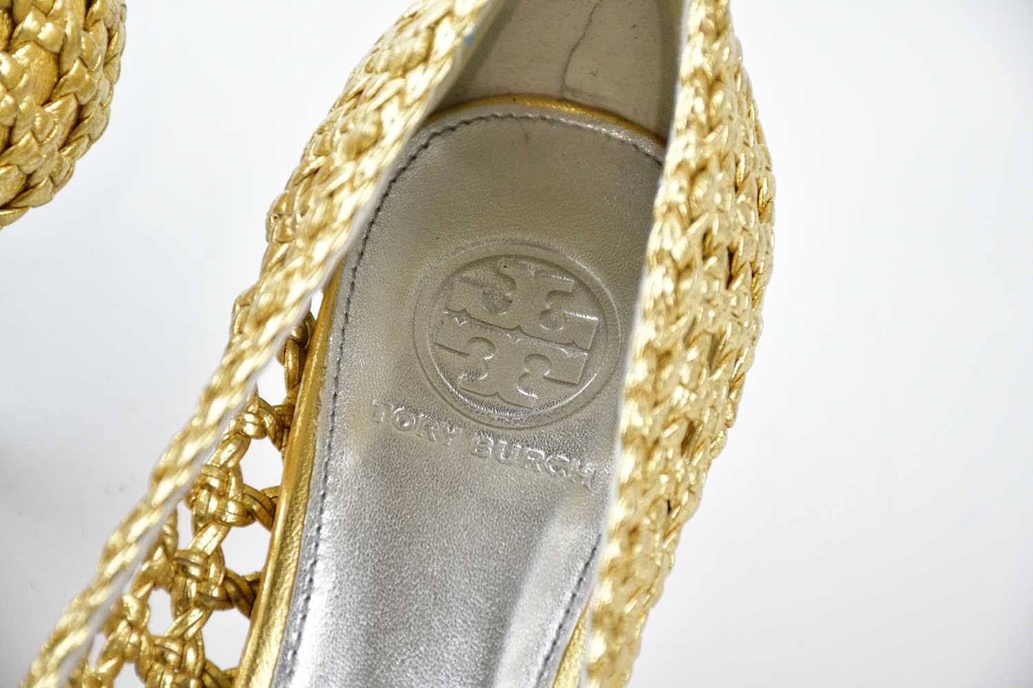 TORY BURCH; a pair of gold and silver metallic Carlyle Madras court shoes with gold tone maker's - Image 3 of 4