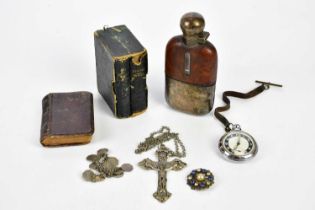 An assortment of collectors items including silver plated hip flask, Ingersoll pocket watch, costume