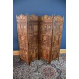 An Eastern carved hardwood four division screen, height 180cm.