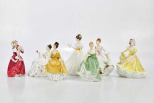 ROYAL DOULTON; a collection of seven figures comprising HN 2193 'Fair Lady', HN 2307 'Coralie', HN