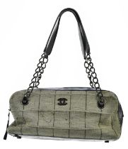 CHANEL; a circa 2000 brown cloth and black leather chocolate bar shoulder bag with black chain and