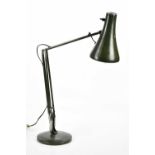 A vintage green Anglepoise lamp.