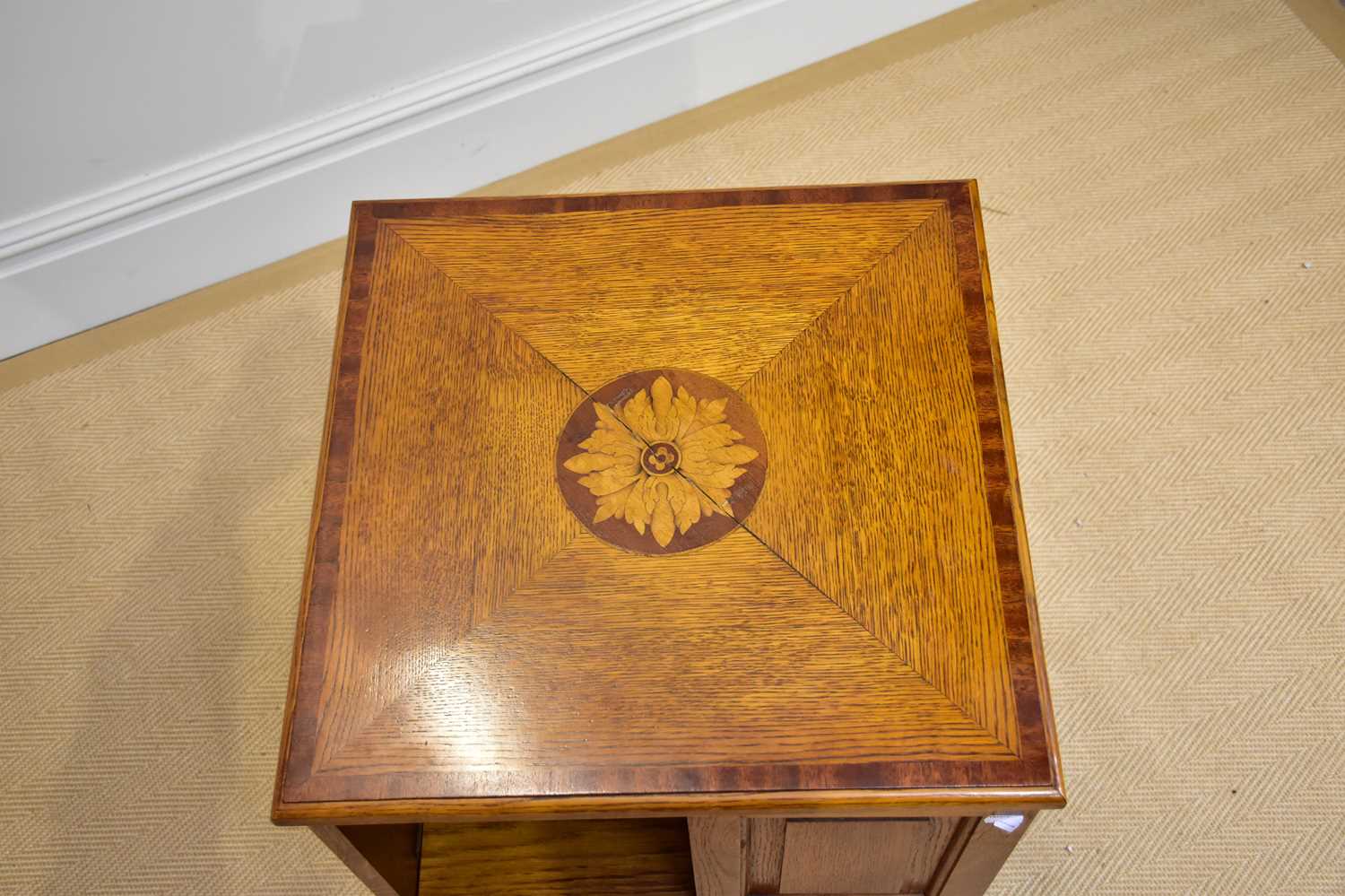 A reproduction inlaid oak revolving bookcase, height 76cm, depth 48cm. - Image 3 of 3