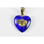 A 9ct yellow gold fine link chain supporting a heart shaped lapis lazuli pendant, length of chain