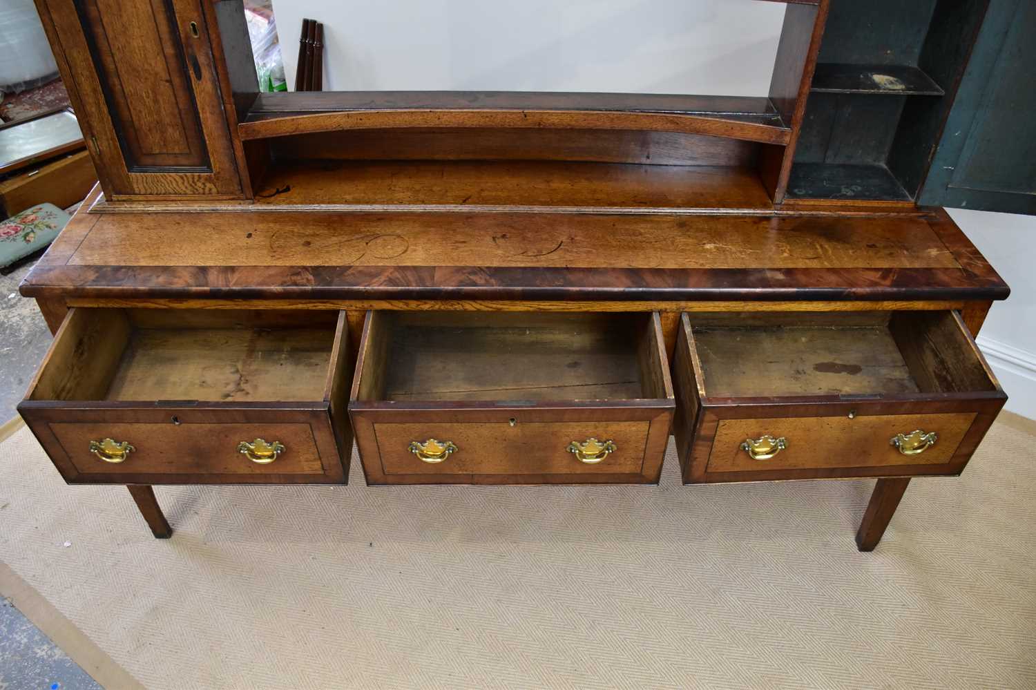 An 18th century oak and mahogany crossbanded dresser with open plate rack back, with three fixed - Image 4 of 4