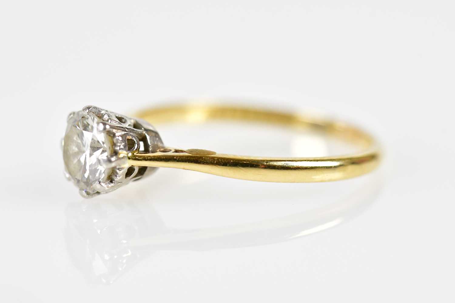 An 18ct yellow gold platinum tipped diamond solitaire ring, the round brilliant cut eight claw set - Image 2 of 7