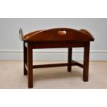 A reproduction mahogany butler's tray, height 60cm, width 79cm, depth 53cm.