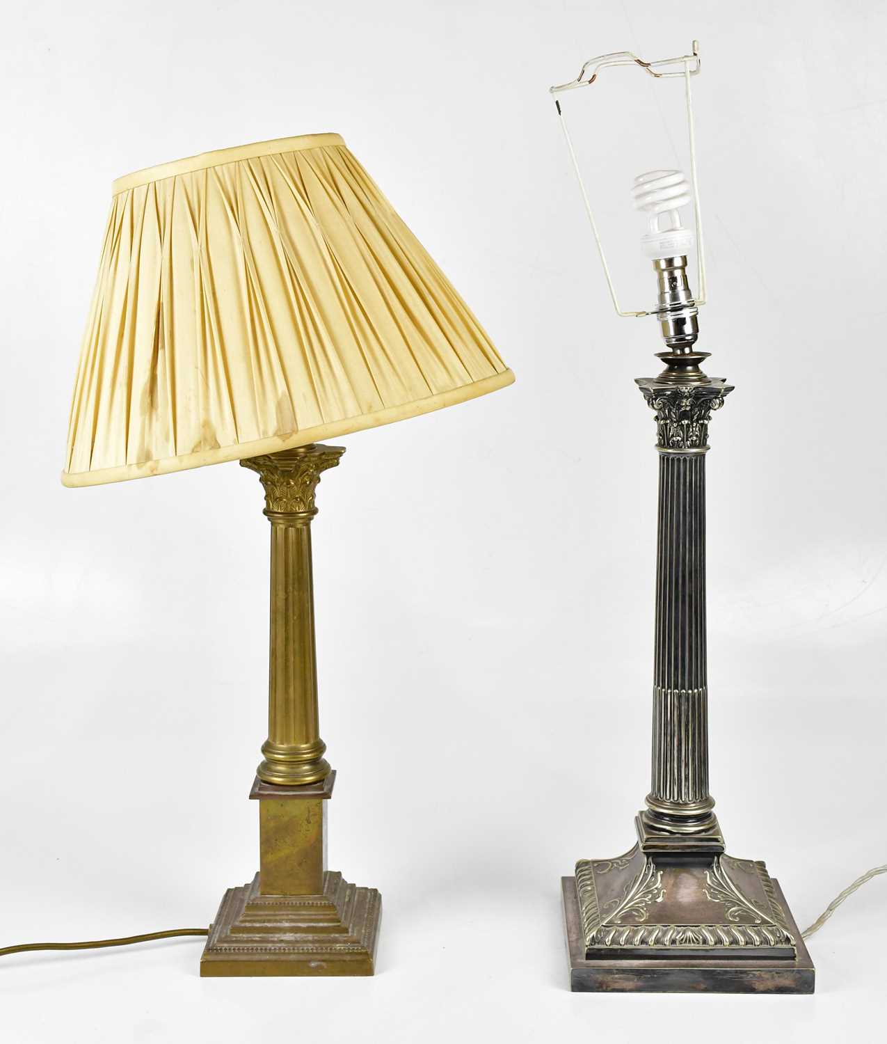 GOLDSMITHS COMPANY; a Victorian silver plated Corinthian column table lamp, on stepped base,