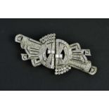 A large and impressive white metal and diamond Art Deco combination brooch/pair of clips, the