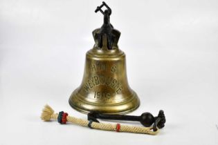 A ship's bell, inscribed 'HMS Weybourne 1919', height 35cm. Condition Report: Diameter at footrim