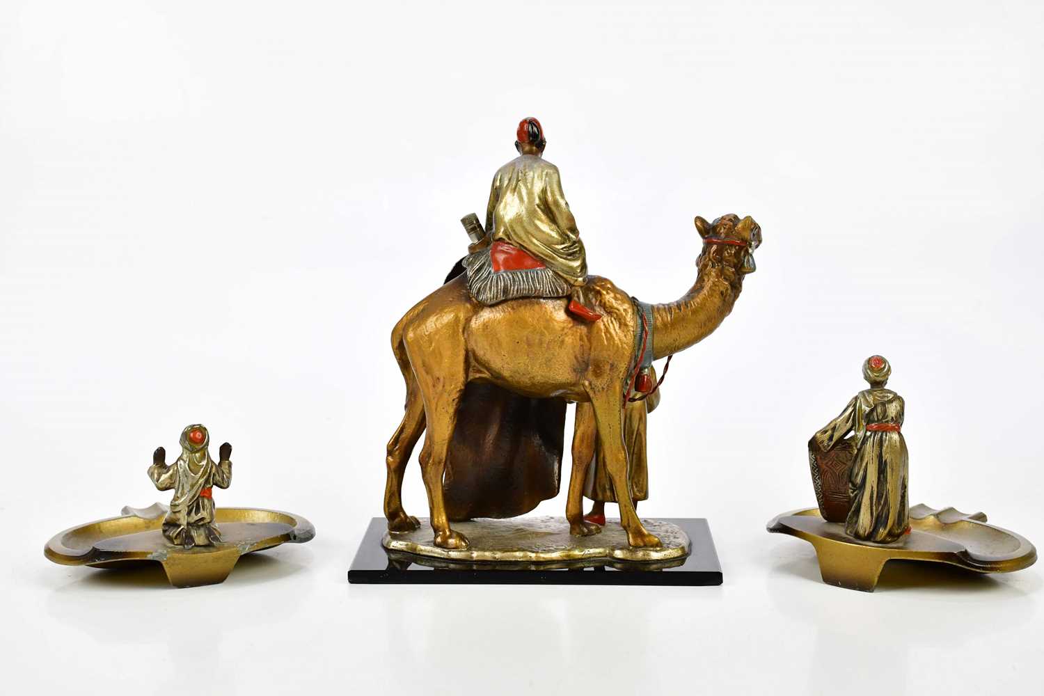 AFTER FRANZ BERGMANN; an Austrian cold painted spelter match striker modelled as a carpet seller - Image 5 of 6