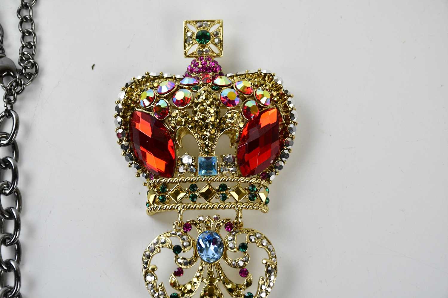 BUTLER & WILSON; a large gold tone brooch with a coronet to top and covered in multicoloured - Image 3 of 3