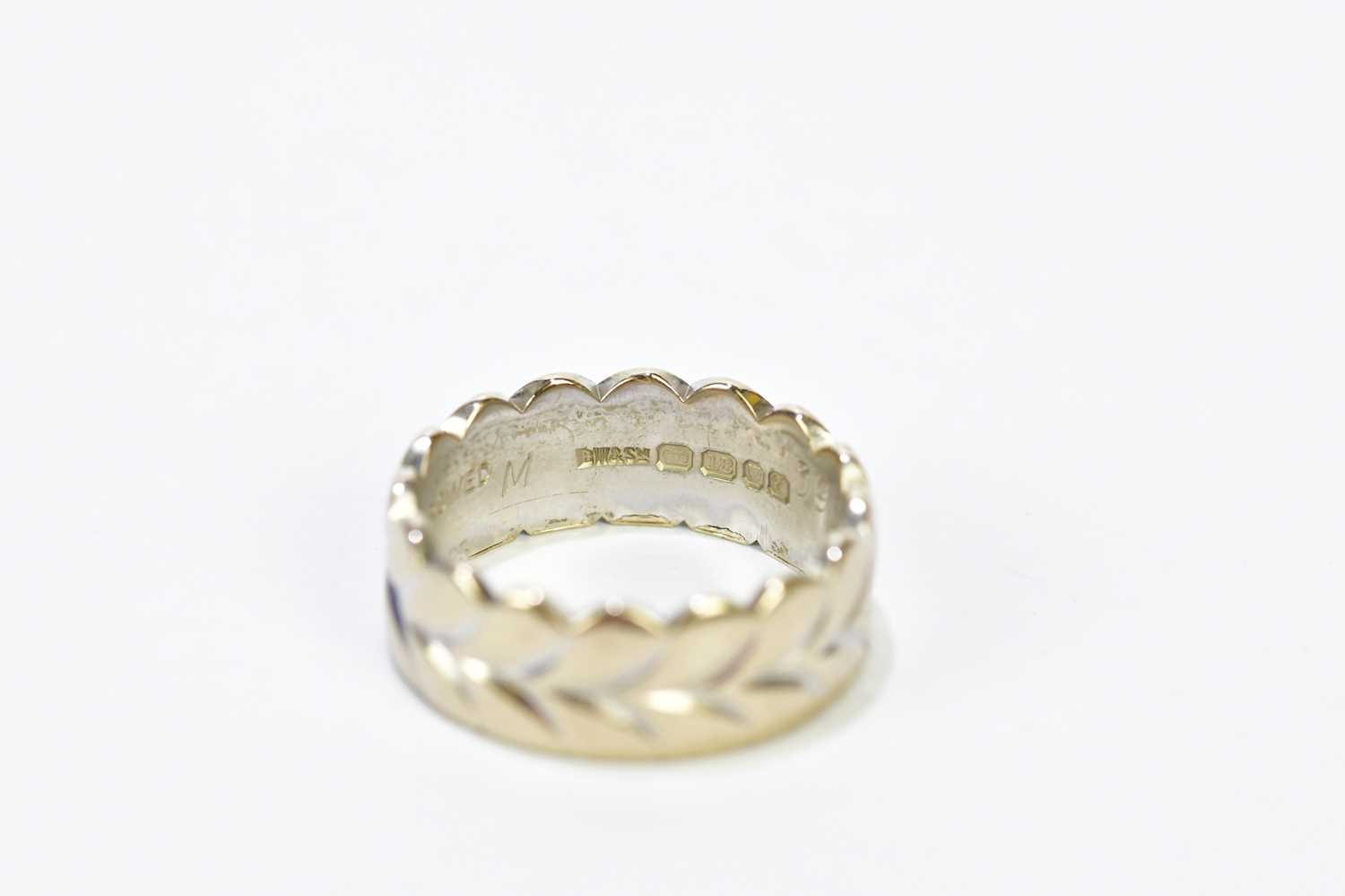 An 18ct white gold and yellow gold engraved wedding band, size L, approx. 7.36g. - Image 3 of 3