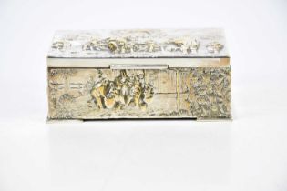A Continental silver plated cigarette box with cedarwood lined interior depicting tavern scenes,