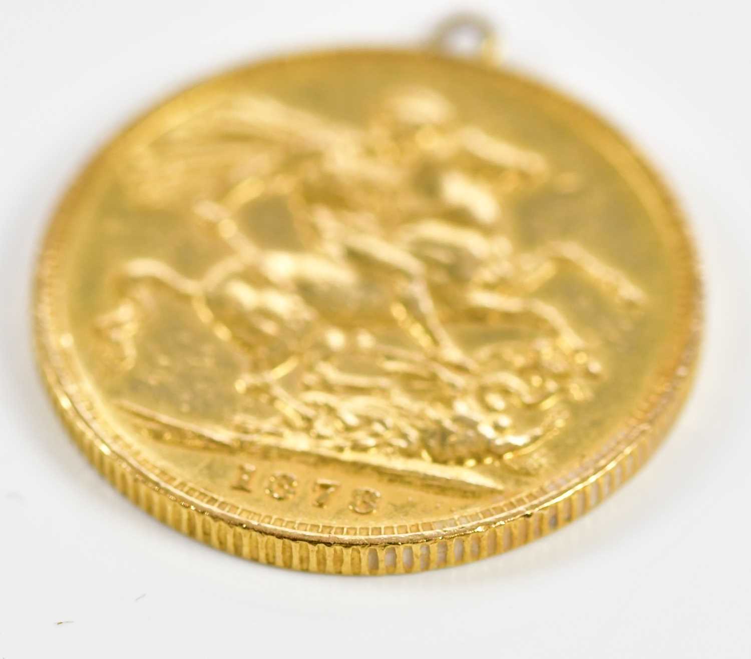 A Victorian full sovereign, 1878, young head, now with pendant loop attachement. - Image 3 of 3