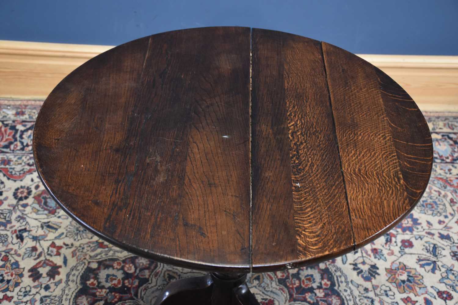 An 18th century oak tilt-top tripod table, height 69cm - Image 2 of 2