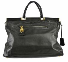 PRADA; a black soft calfskin leather handbag with red calfskin leather interior, rolled leather