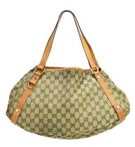 GUCCI; a MM monogram canvas Abbey Hobo handbag trimmed with leather, with gold tone hardware