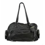 PRADA; a multi pocket Tessuto nylon and black leather handbag with silver tone hardware bag tag