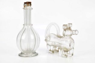 A 19th century free blown glass decanter modelled as a pig with applied decoration, length 23cm, and