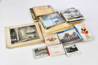 A collection of 19th century and later postcards relating to geographic locations, humorous