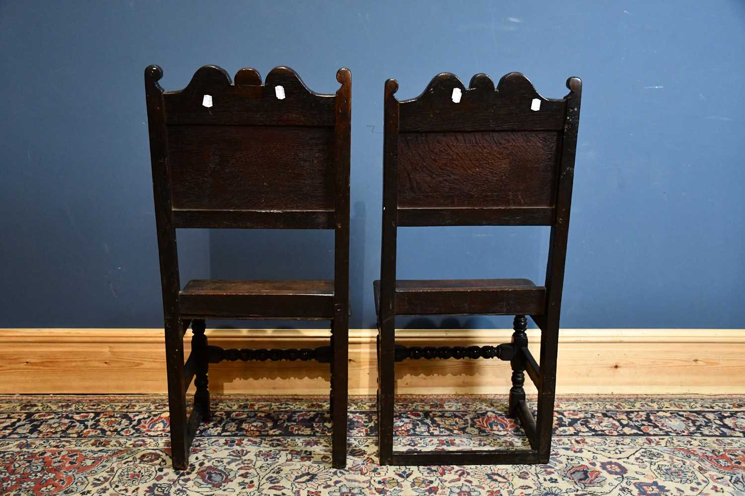 A pair of oak back stools, circa 1700, with panelled backs and plank seats, on turned and block - Image 4 of 12