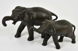 Two bronze models of elephants, length of largest 13cm (2)