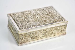 A Indian plate mounted wood cigarette box, with allover scrolling detailing,. length 15.5cm.