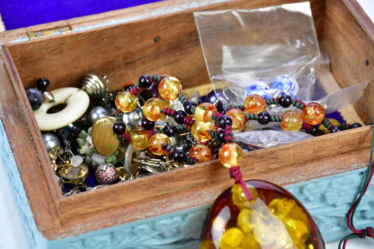 A group of costume jewellery, including an abstract silver bracelet, lucite pendant on chain, - Image 3 of 3