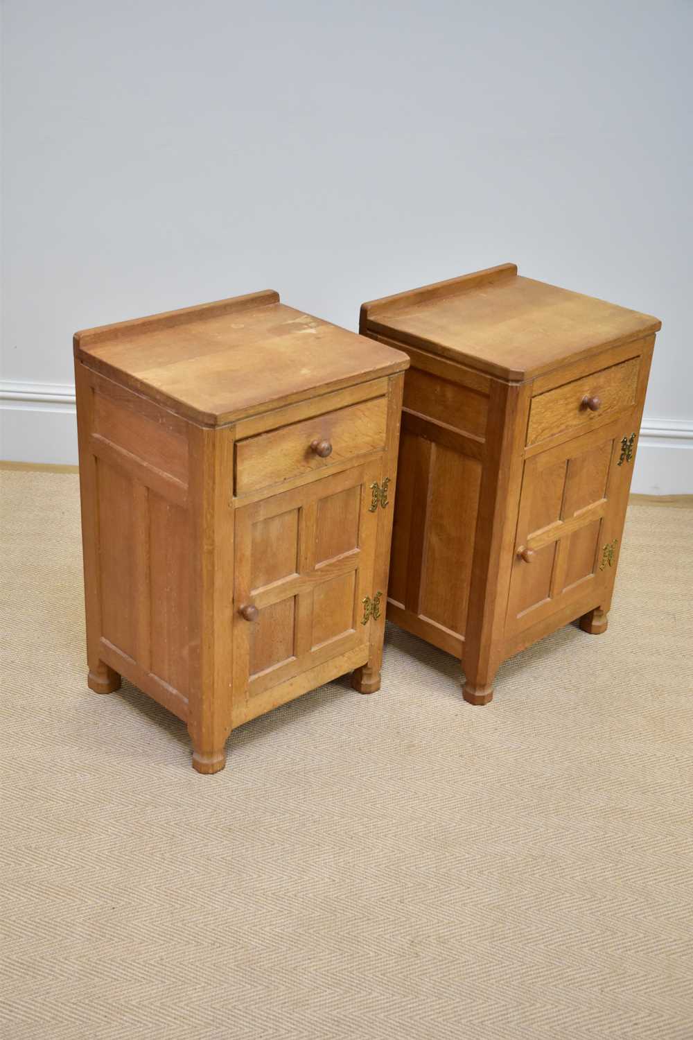 ALBERT 'EAGLEMAN' JEFFRAY; a pair of light oak bedside cupboard, each with a drawer and cupboard