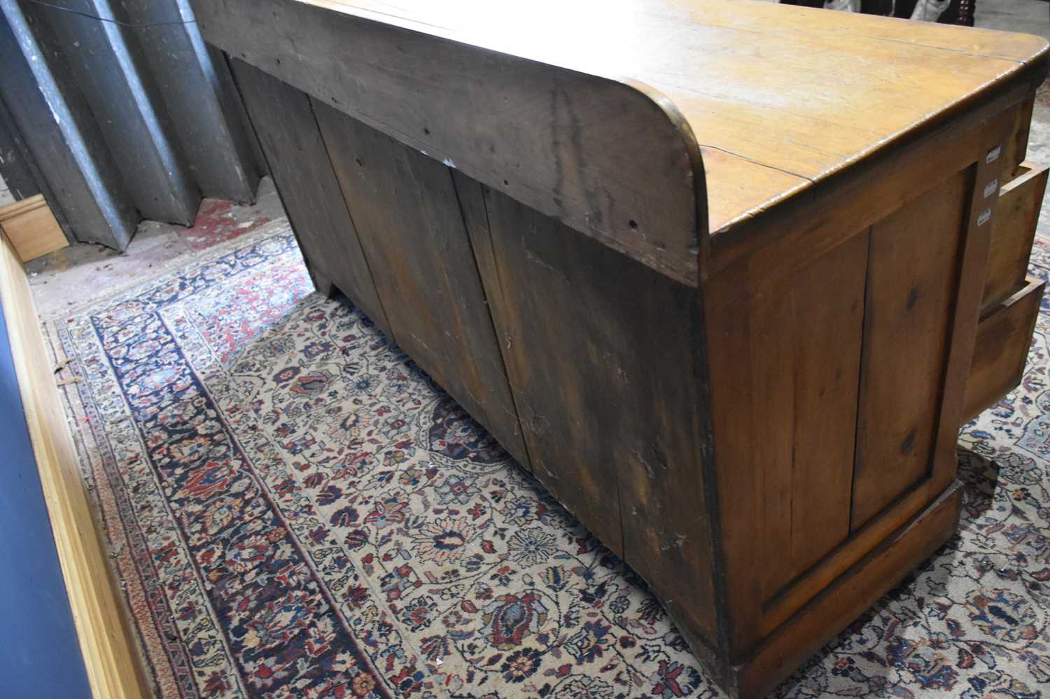 A Victorian pine dresser base with an arrangement seven drawers and panelled cupboard door on plinth - Image 4 of 4