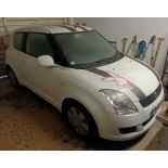 A SUZUKI Swift petrol three door hatchback, 1328cc, registration MA10BYC, with one key and V5