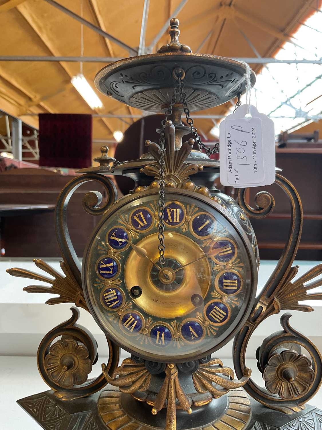 An aesthetic movement French bronze and gilt metal mantel clock with circular finial above the - Image 9 of 10