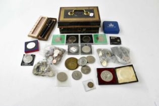 A small quantity of assorted coinage including various threepence pieces, Duke of Wellington