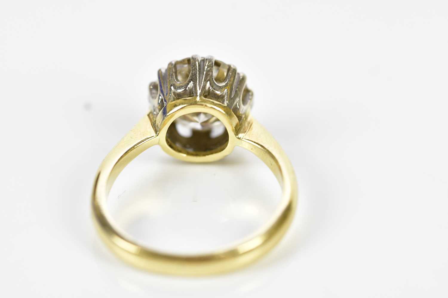 A yellow metal diamond solitaire ring, the round brilliant cut claw set stone weighing approx. 2. - Image 3 of 3