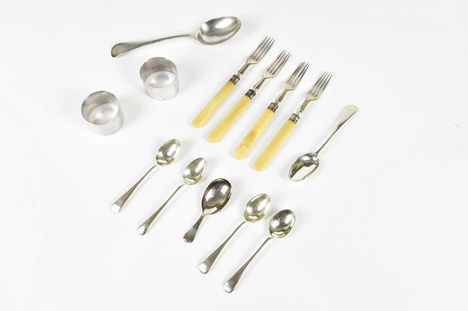 HARRISON BROTHERS & HOWSON; a set of four Victorian hallmarked silver forks, with resin handles,