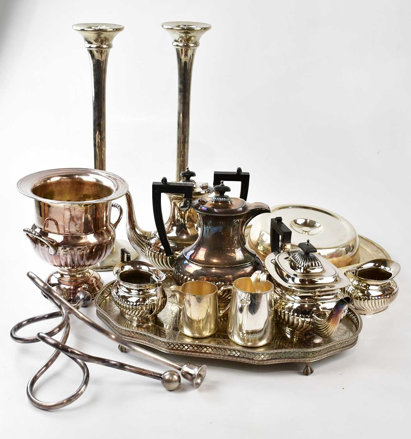 A collection of silver plated items to include trays, four piece tea set, coffee pot,