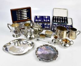 A collection of plated items including salvers, mugs, a three piece tea set, cased cutlery, etc.