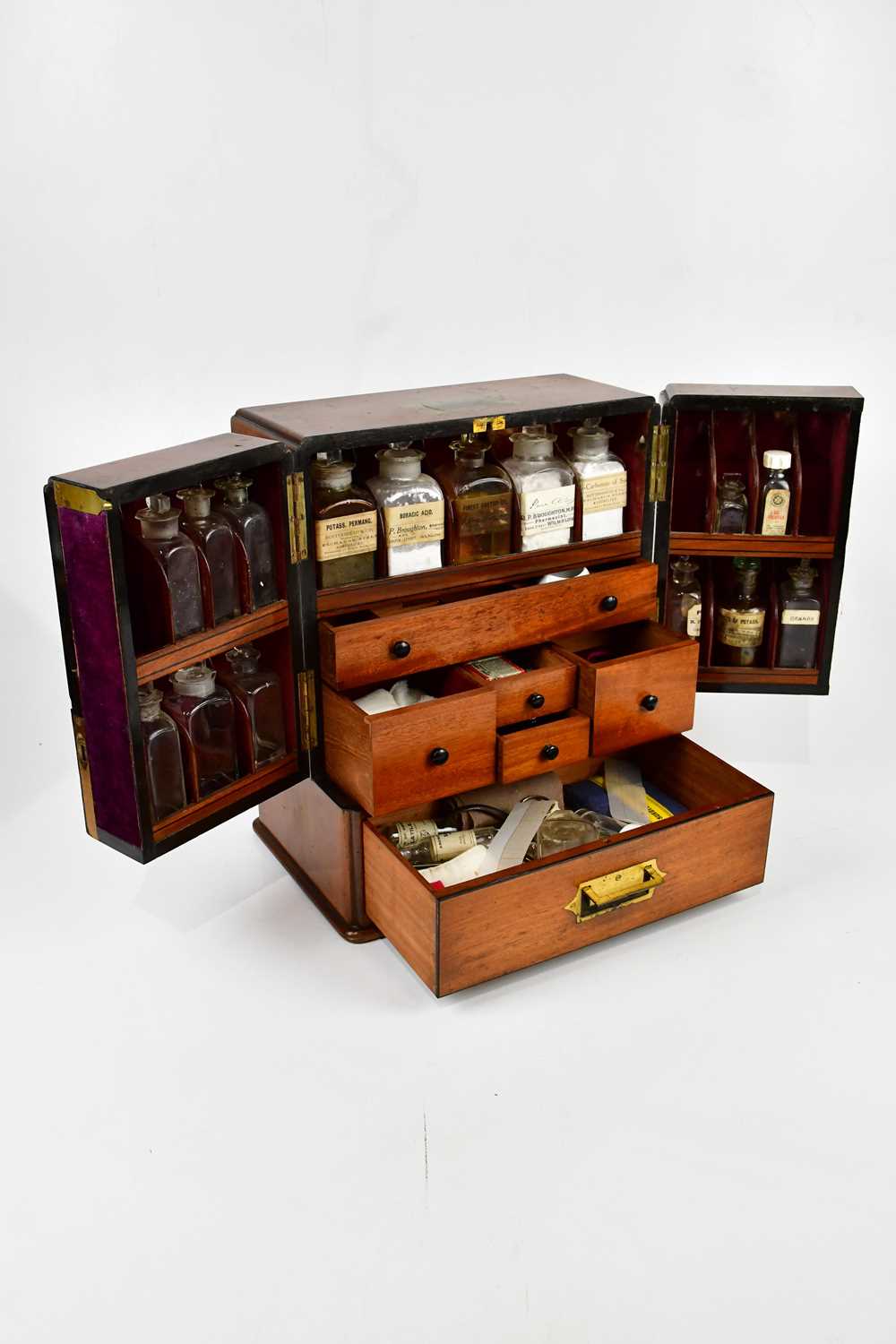 A Regency mahogany apothecary cabinet, the pair of doors enclosing an arrangement of bottles and - Image 3 of 5