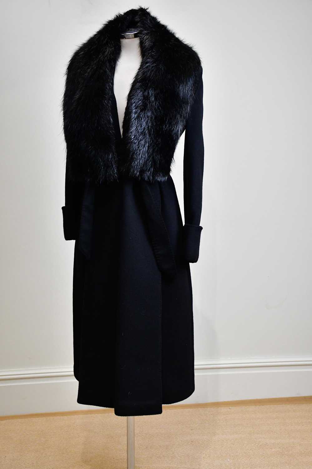 ALEXANDER MCQUEEN; an unworn autumn/winter c2006 100% cashmere black full length lady's coat with