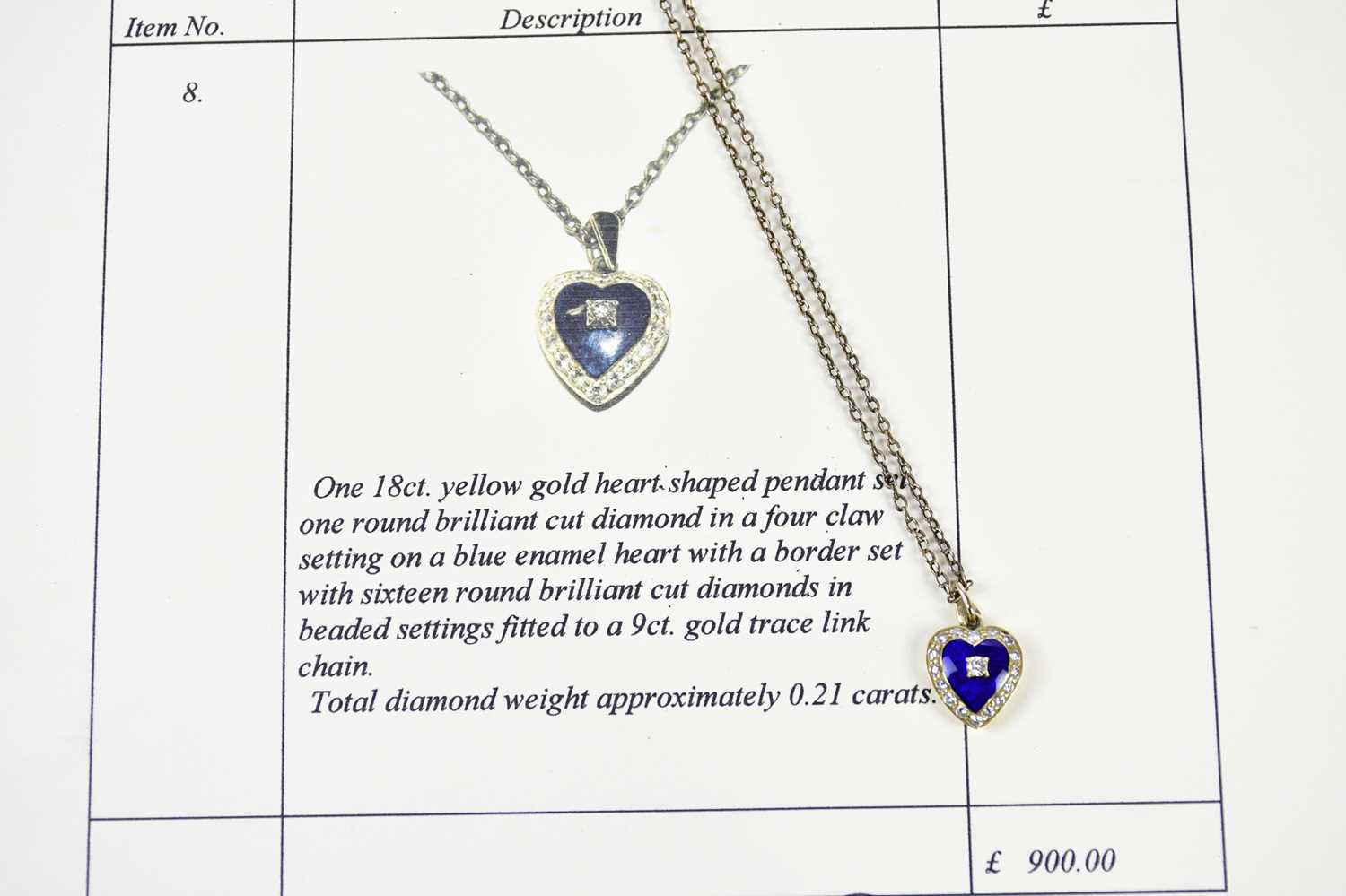 An 18ct yellow gold heart shaped pendant centred with a round brilliant cut diamond on a blue - Image 5 of 5