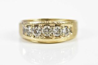 A 14ct yellow gold five stone graduated diamond ring, the round brilliant cut stones totalling