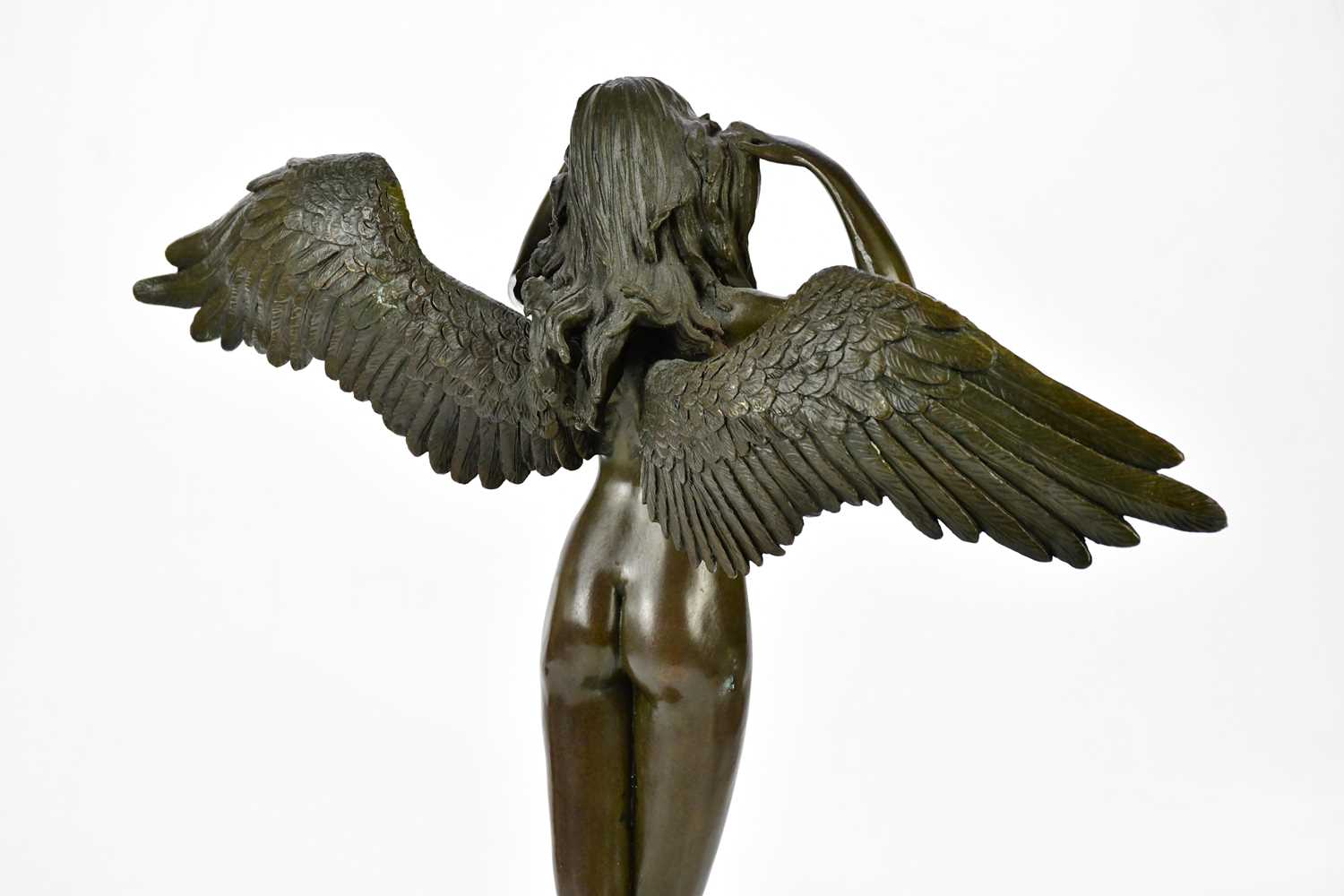 A reproduction bronze figure representing a winged nude maiden, height 53cm. - Image 4 of 6